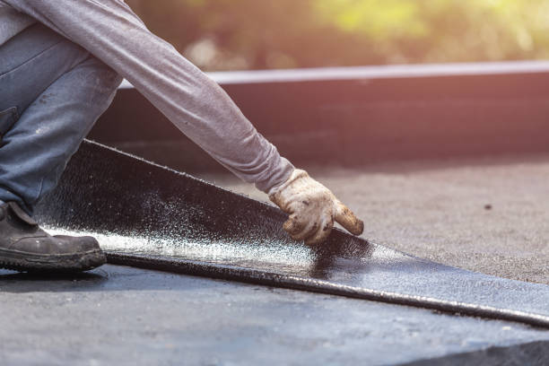 Professional Basement Waterproofing technician working in Mayville, NY